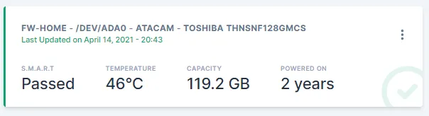 Scrutiny dashboard tile for the OPNsense box's Toshiba drive /dev/ada0, showing S.M.A.R.T status Passed, 46°C, 119.2 GB capacity and 2 years powered on